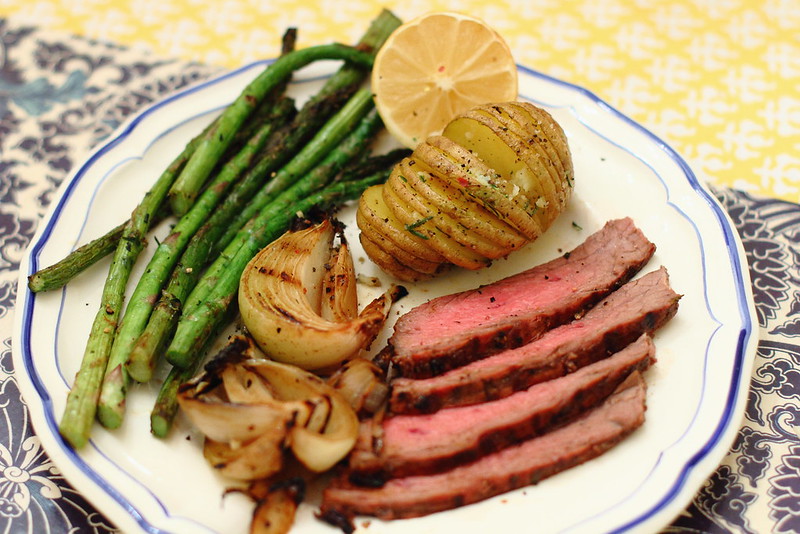 Sunday Night Dinner: Balsamic Flank Steak and Onions with Accordion Potatoes and Grilled Asparagus