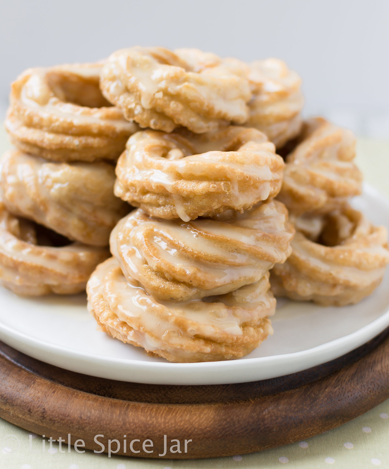 stack of dripping honey crullers