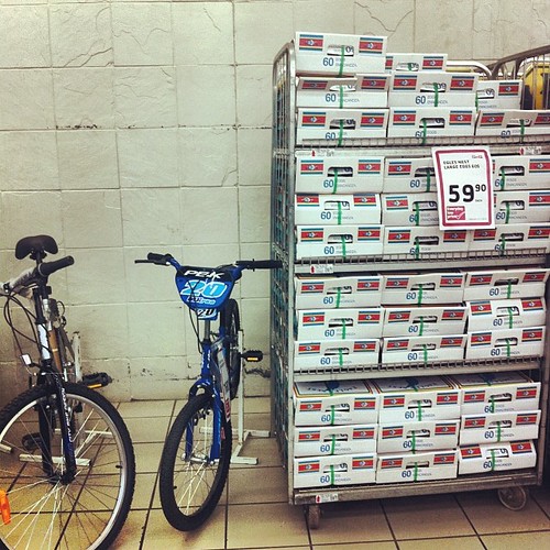 Get your eggs then buy a bike to take them home.  By the way, those eggs are 60 for $6.   #swazifood #swaziland #picknpay #thehub #juxtaposition #wewillbeeatingalotofeggs #swazilandtripnovember2013