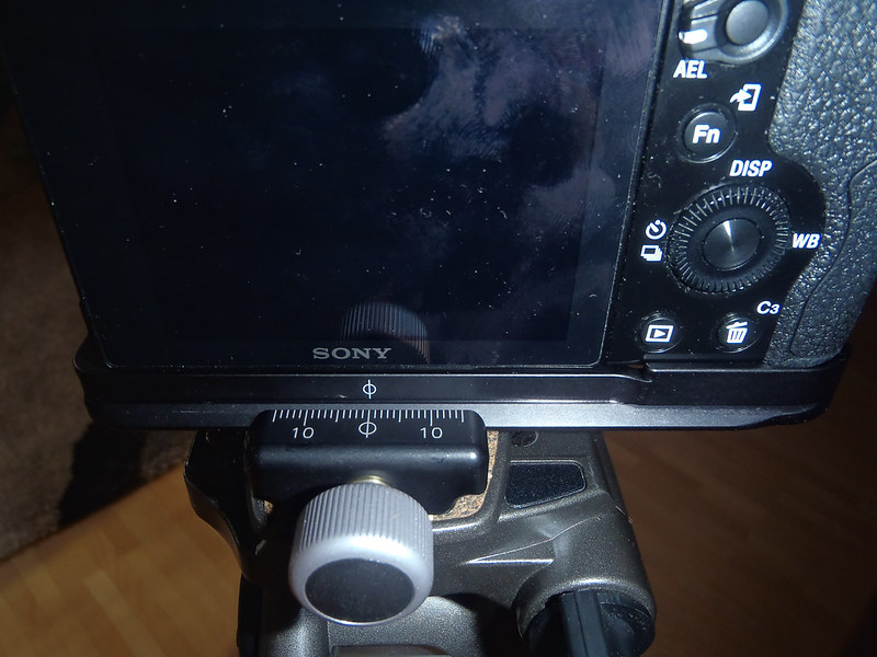 Sony Alpha 7 mounted on a tripod using the Arca-Swiss plate+clamp