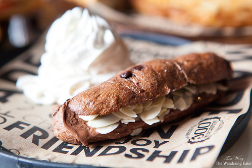 Montadito #96 - Nutella with almonds in a chocolate bread and served with fresh sweetened whipped cream