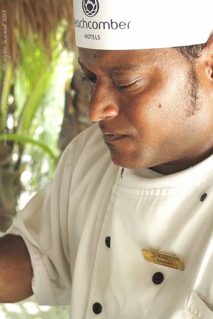 Steven Preparing Creole chicken at Ocean Restaurant- Saint Anne Resort
