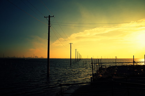 offshore poles at sunset