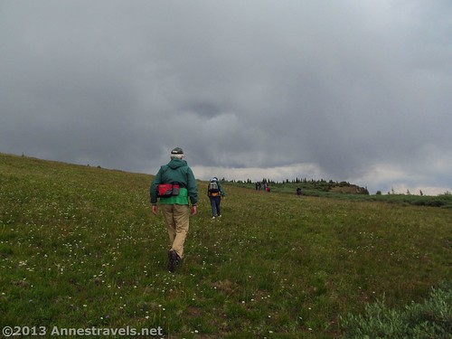 Heading back to the van as storm clouds brew around us near Amphitheatre Peak, Flat Tops Wilderness Area, Colorado