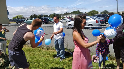 CDI College Student Appreciation BBQ in Victoria, BC - Everybody is Playing Shave the Balloon Group Game