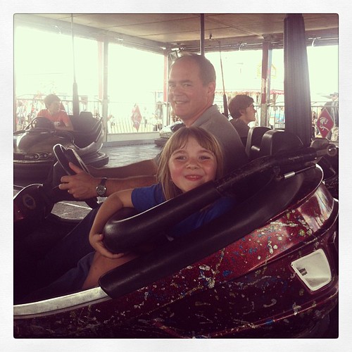Daddy and daughter on a mission. #msstatefair2013 #bumpercars #statefair #daddyanddaughter