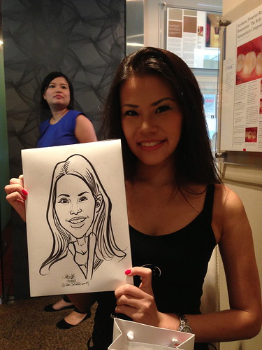 caricature live sketching for Miss Universe Singapore 2013