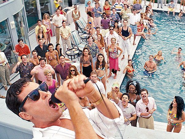 leonardi dicaprio standing over a pool in wolf of wall street