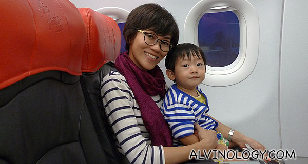 Rachel and Asher on an AirAsia flight 