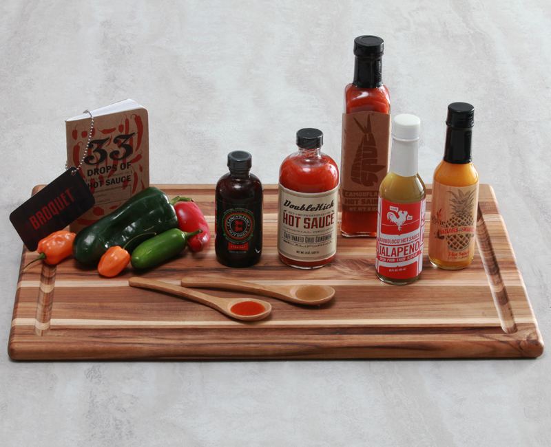 Hot sauce gift set featuring five of the most awesome chili sauces in the US, plus a hot sauce tasting book