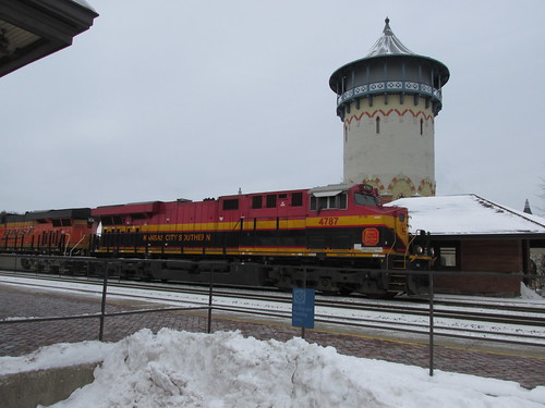 An eastbound BNSF Railway freight train with a Kansas City Southern Railroad locomotive up front.  Riverside Illinois.  December 2013. by Eddie from Chicago