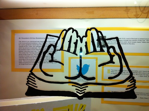 Open hands design  from Mr/ Penumbra's bookstore window