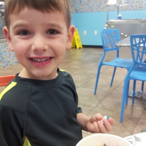 On a date with this cutie. I think he may be part elf, because he had candy cane yogurt, candy and candy corn toppings and hot fudge, which is as close to syrup as you can get. Covered all 4 elf food groups in one cup (plus fruit loops, because one can ne