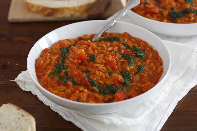 chunky red pepper soup with orzo and herb oil