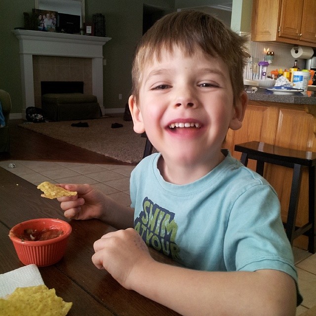 Enjoying homemade salsa with my biggest buddy. I have him his love for salsa while he was still in utero.