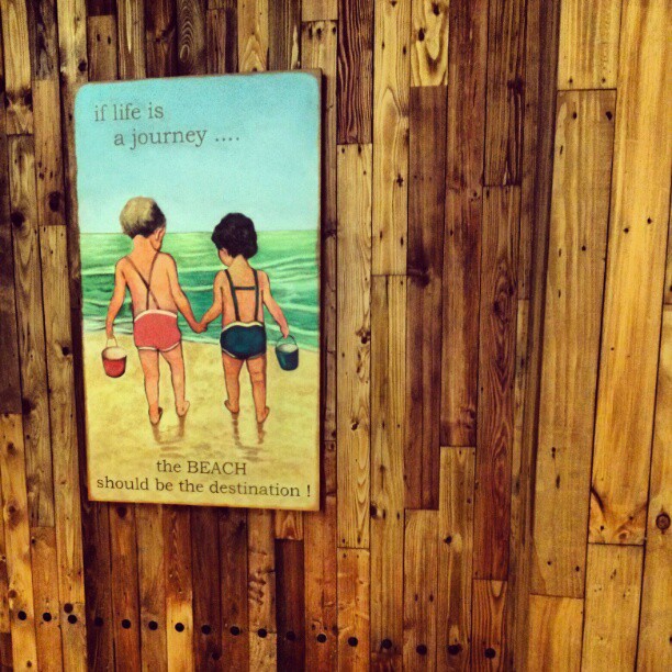 Two boys at a beach. Seen in a mall in Jakarta. #iseefreedom 