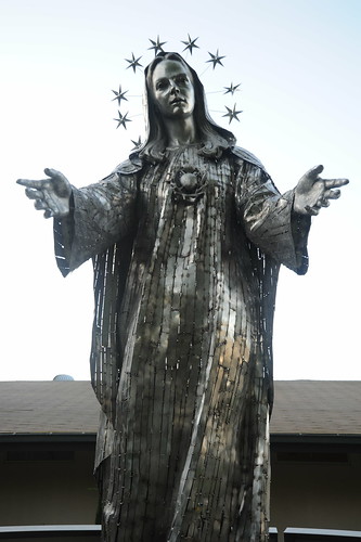 Our Lady of Peace, statue of Mary, halo of stars, approximately life sized Marian statue, stainless steel, inner courtyard, Our Lady of Peace Church and Shrine, Santa Clara, California, USA by Wonderlane