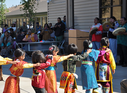 Students perform a traditional dance at the school’s dedication.