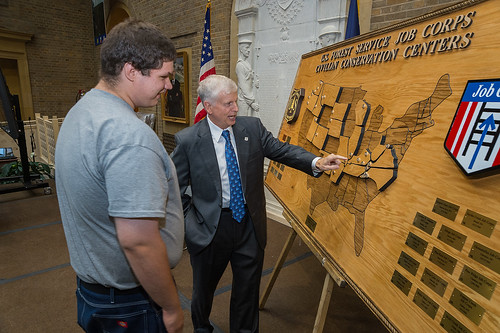 Daniel Stevenson, carpentry student of the Collbran Job Corps Center shows Tom Tidwell, Chief, U.S. Forest Service a map he created of the 28 Job Corps Centers in the United States at the 50th Anniversary of the Job Corp Civilian Conservation Centers celebration at the United States Department of Agriculture in Washington, DC, Wed. Sept. 17, 2014. The U.S. Forest Service operates the Job Corps Civilian Conservation Corps, the Nation’s largest residential, educational and career technical training program for young Americans. USDA photo by Bob Nichols.