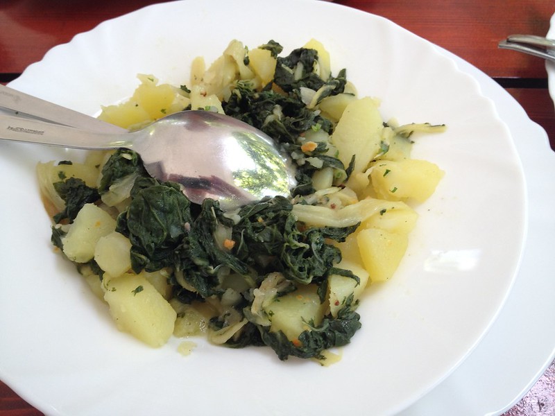 Boiled potatoes and kale