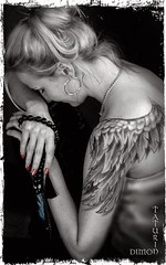Angel wing tattoo