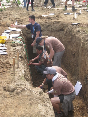 Students dig-in with their competition during the 1st International Soil Judging Contest held in Jeju, South Korea in June.