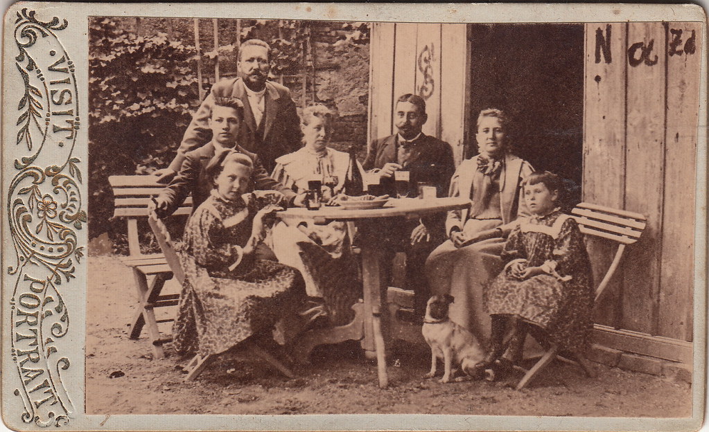 Souvenir portrait "at table" (c.1890s)