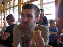 Shaun eats a mustard cracker sandwich