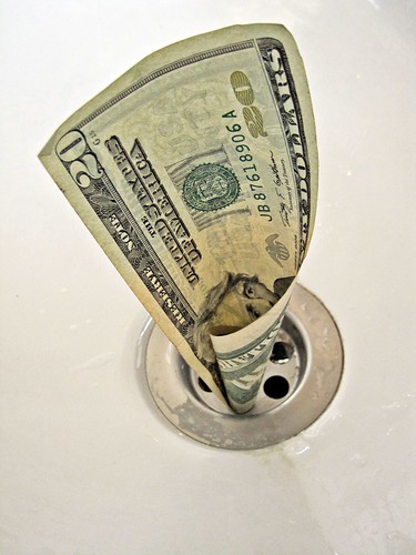 Money down the drain picture