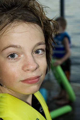 boy sunset lake water face yellow closeup swimming dock eyes dusk missouri nephews lakeoftheozarks lifejacket