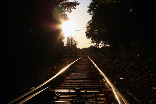 road railroad autumn trees sunset orange brown sun fall bright tracks rail flare