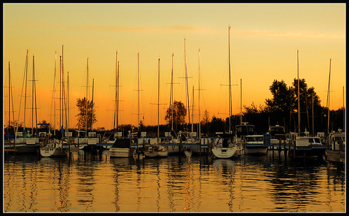 sunset boats dusk michigan scenic portsanilac