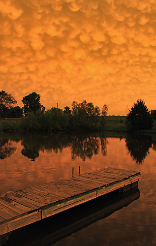 lake reflection water weather dock missouri thunderstorm severeweather stormchasing mammatus