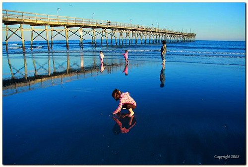 blue woman playing beach water kids canon evening pier october northcarolina sunsetbeach relfection bej 40d abigfave