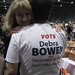 Debra Bowen hugging norm for wearing her tee shirt