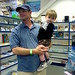 grandpa jeff helping sequoia check out the gift shop at hiller air museum   DSC01219