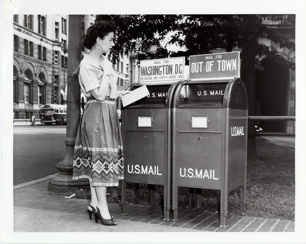 Woman Mailing a Letter