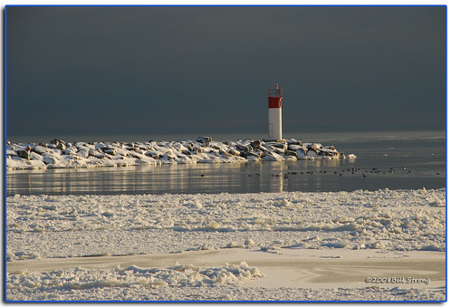 lighthouse snow ice water grandriver portmaitland