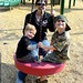 rachel and her boys on the tire swing   DSC01255