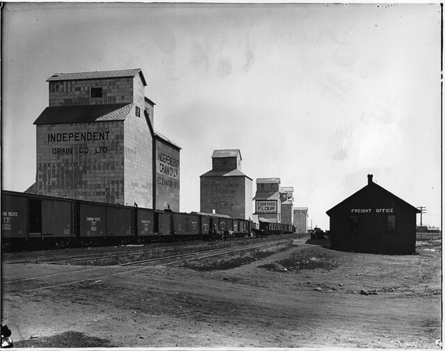 Grain elevators and train, Claresholm, AB, 1918