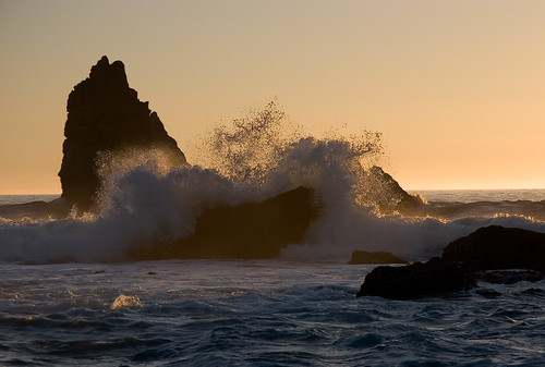 ocean sunset sky rocks waves