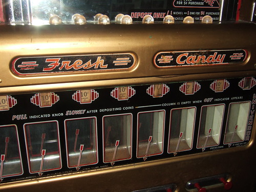Very old candy vending machine