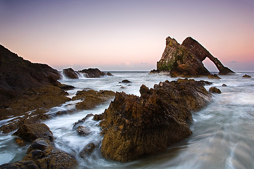 ocean sunset sea scotland rocks dusk moray morayshire portknockie moraycoast bowfiddlerock davidlangan