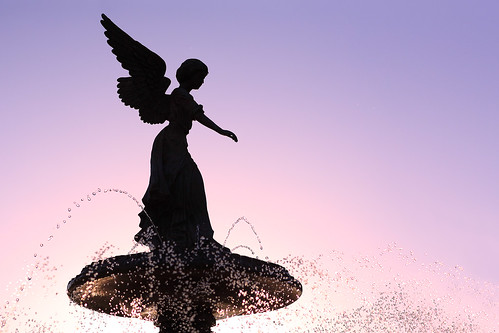 pink light shadow sky sun sunlight color colour classic water fountain beautiful silhouette wisconsin angel landscape outdoors design drops dancing fineart lavender vision backlit hue wi stockphoto lakegeneva artistry mythical stockphotography soliel royaltyfree rightsmanaged rivierapier