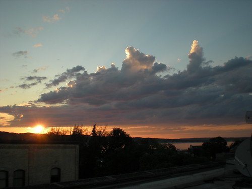 sunset sun rooftop clouds traversecity
