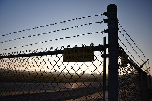 california sunset usa west sign america corner fence airport wire nikon fat telephone united unitedstatesofamerica chain number chainlink international american fresno link barbedwire states masters chainlinkfence barbed 2009 fenceline d90 southernbreeze nikond90 fresnoairterminal