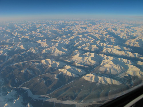snow mountains sunrise airplane rockies aircraft alberta airborne