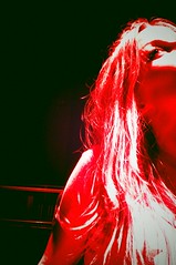 Sarah in red, red light