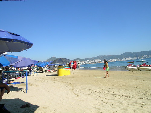 ocean vacation beach water mexico bay sand scenery view pacific playa pacificocean acapulco trips kiosk umbrellas jetski laplaya skidoo mex jetskis acapulcobay mexico2008 12222008 playahornos