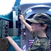 camo nick going to town in a simulated cockpit at hiller air museum   DSC01220